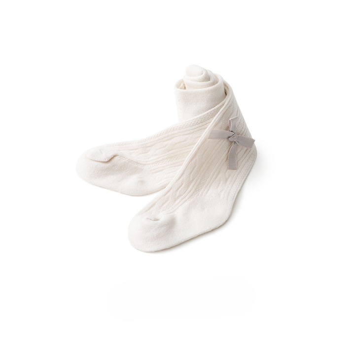 A pair of Baby Girl Solid Color Covered Leggings in various colors, showcasing their soft cotton material and elastic waistband.