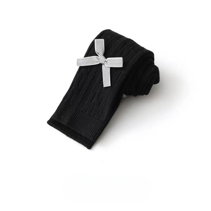 A pair of Baby Girl Solid Color Covered Leggings in various colors, showcasing their soft cotton material and elastic waistband.