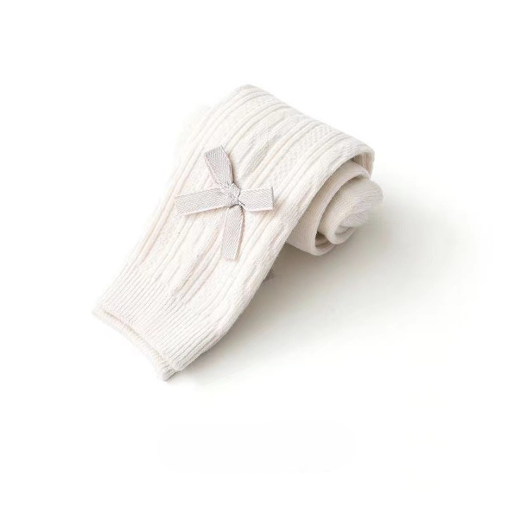 A pair of Baby Girl Solid Color Covered Leggings in various colors, showcasing their soft cotton material and elastic waistband.