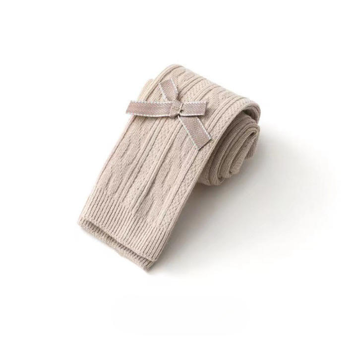 A pair of Baby Girl Solid Color Covered Leggings in various colors, showcasing their soft cotton material and elastic waistband.