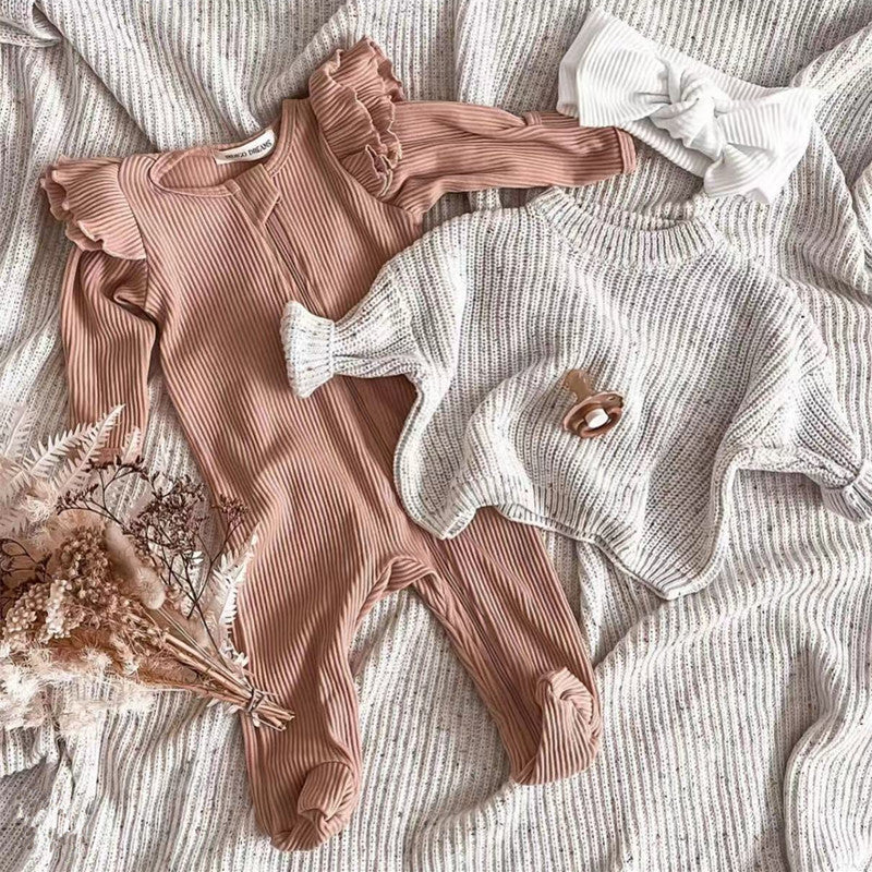 Baby Girl Solid Color Elastic Cotton Romper Jumpsuit in various colors, showcasing its soft fabric and comfortable design.