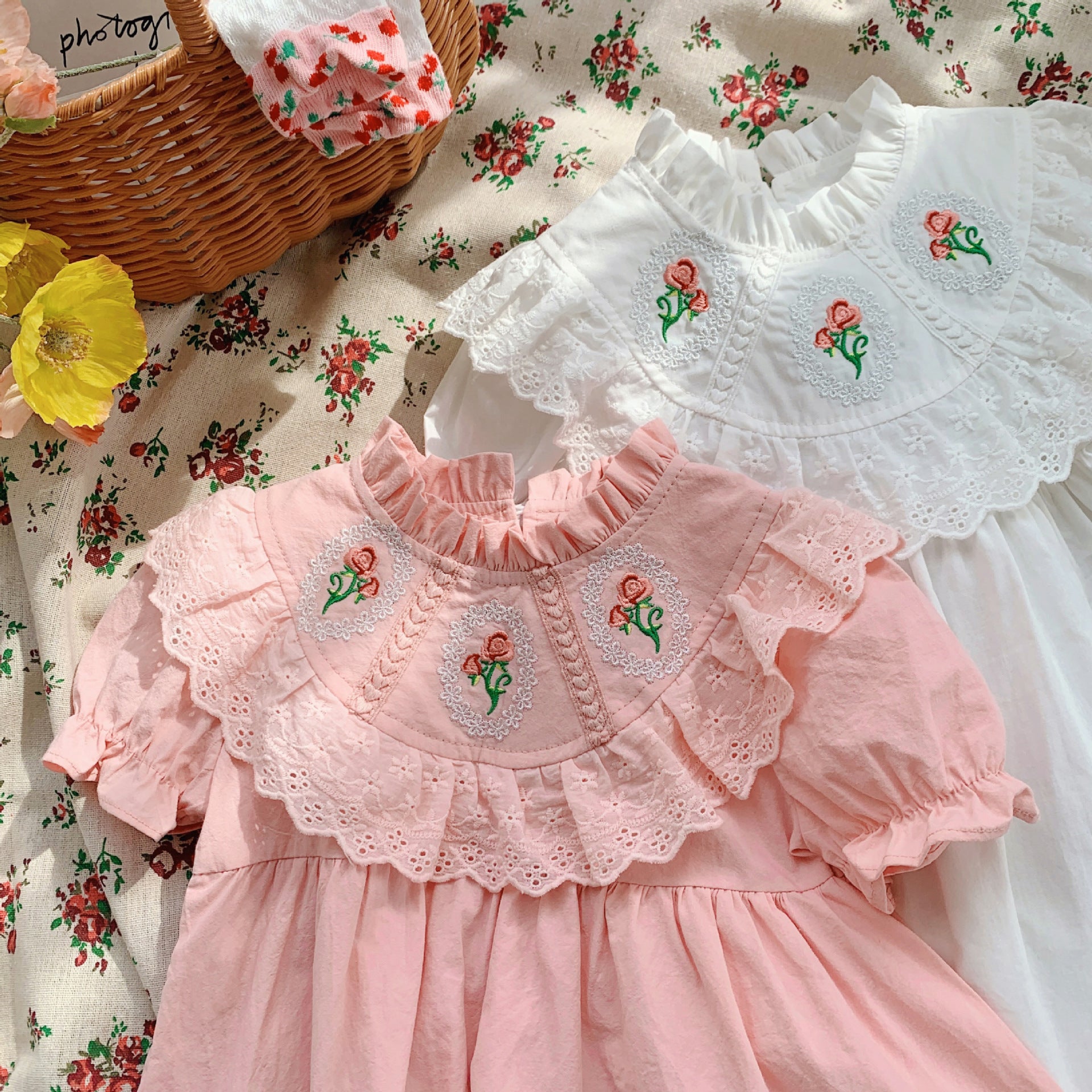 Baby Girl Solid Color Embroidered Pattern Loose Dress in white and pink, showcasing floral embroidery and a loose fit for comfort.