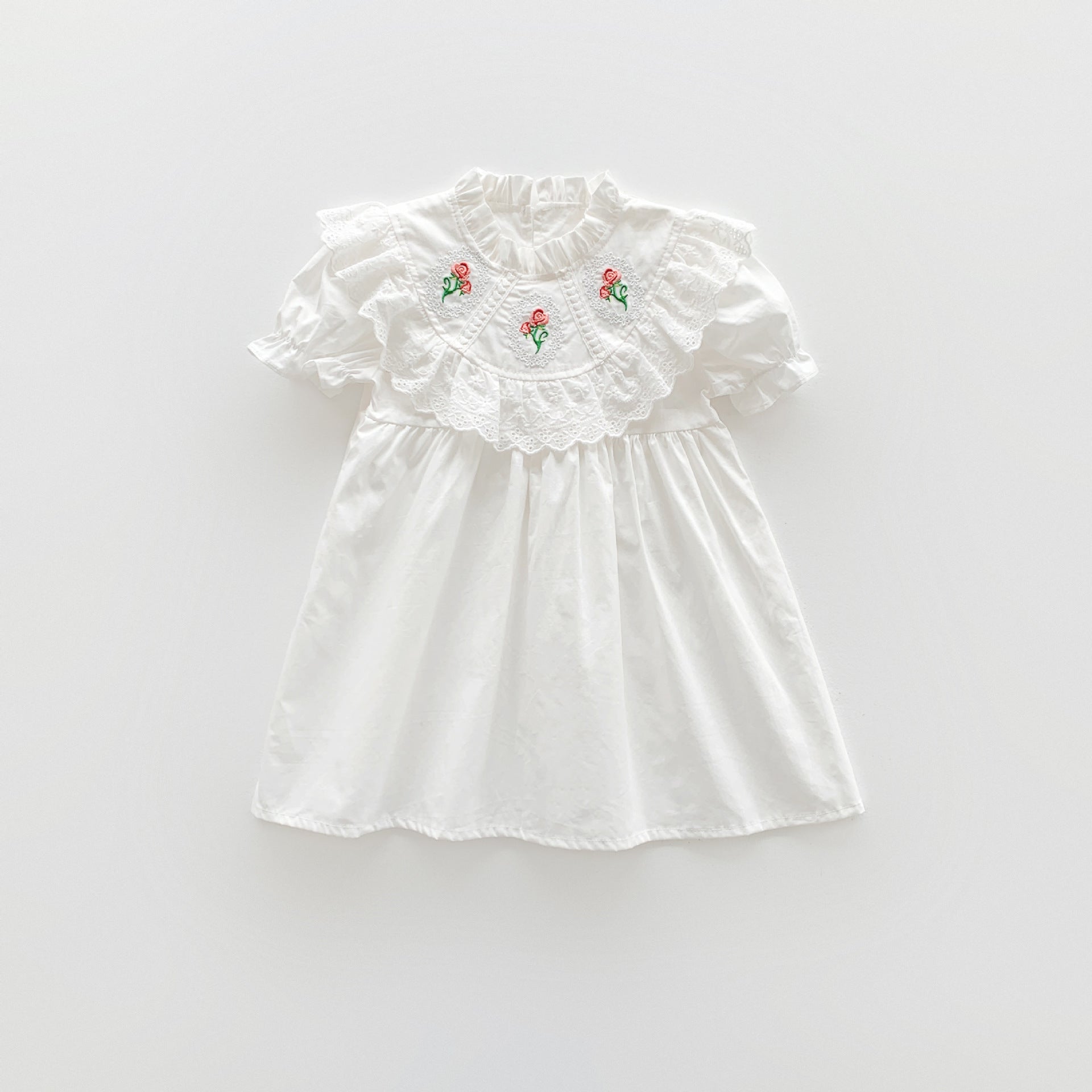 Baby Girl Solid Color Embroidered Pattern Loose Dress in white and pink, showcasing floral embroidery and a loose fit for comfort.