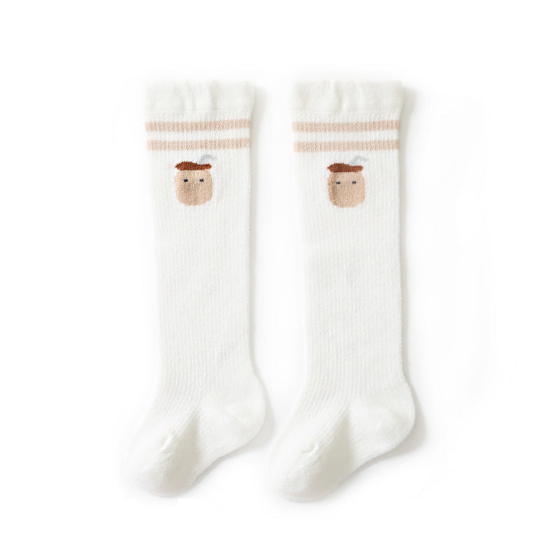 Baby girl knee socks with floral embroidery in various solid colors, made from breathable cotton.