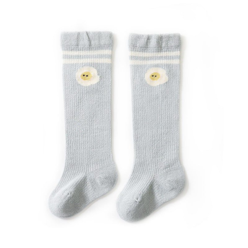Baby girl knee socks with floral embroidery in various solid colors, made from breathable cotton.