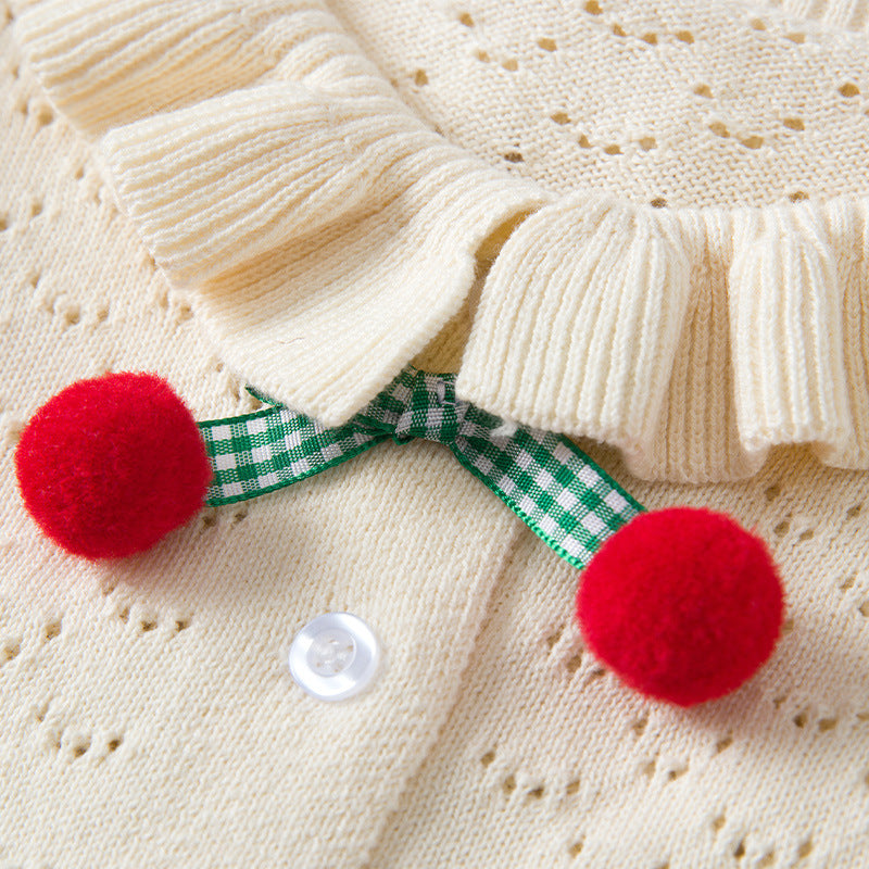 Baby girl cardigan in solid color with hollow carved design and cherry patches, perfect for spring and autumn wear.