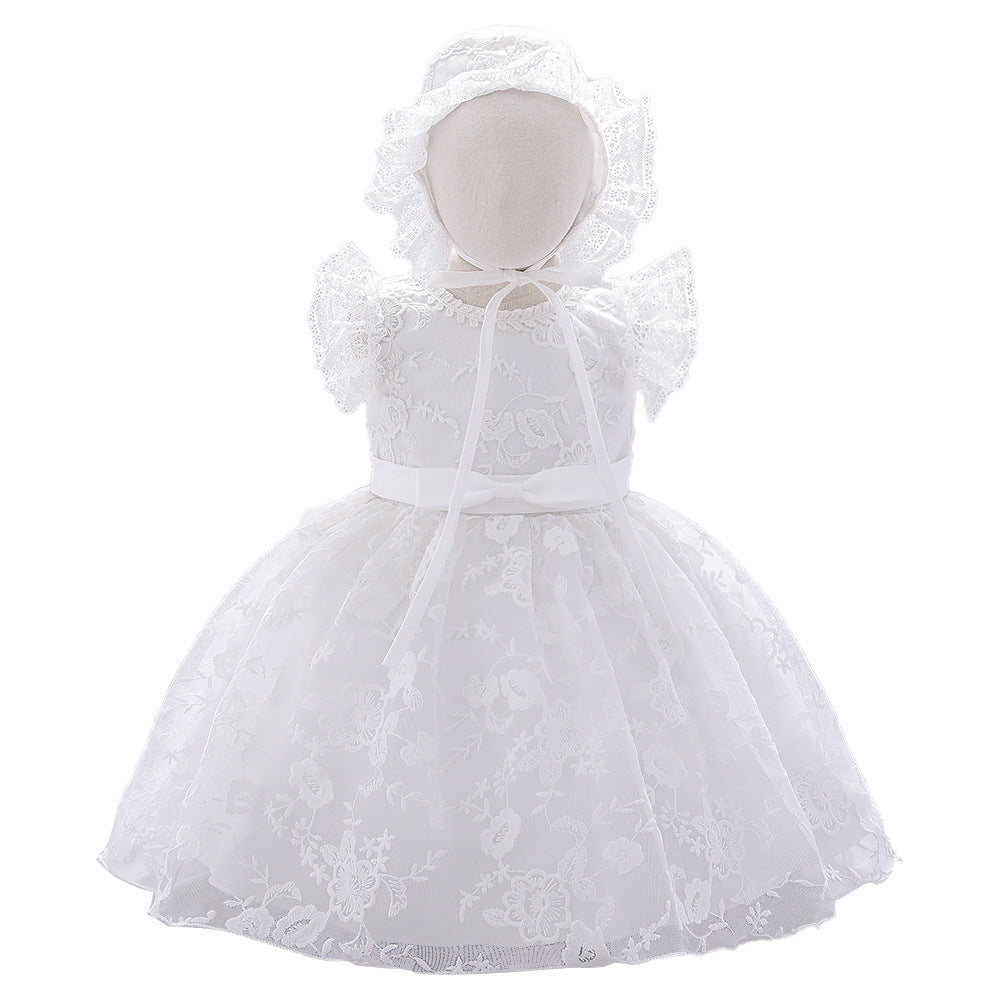 Baby girl dress with solid color mesh overlay and matching hat, perfect for formal occasions like baptisms and birthdays.