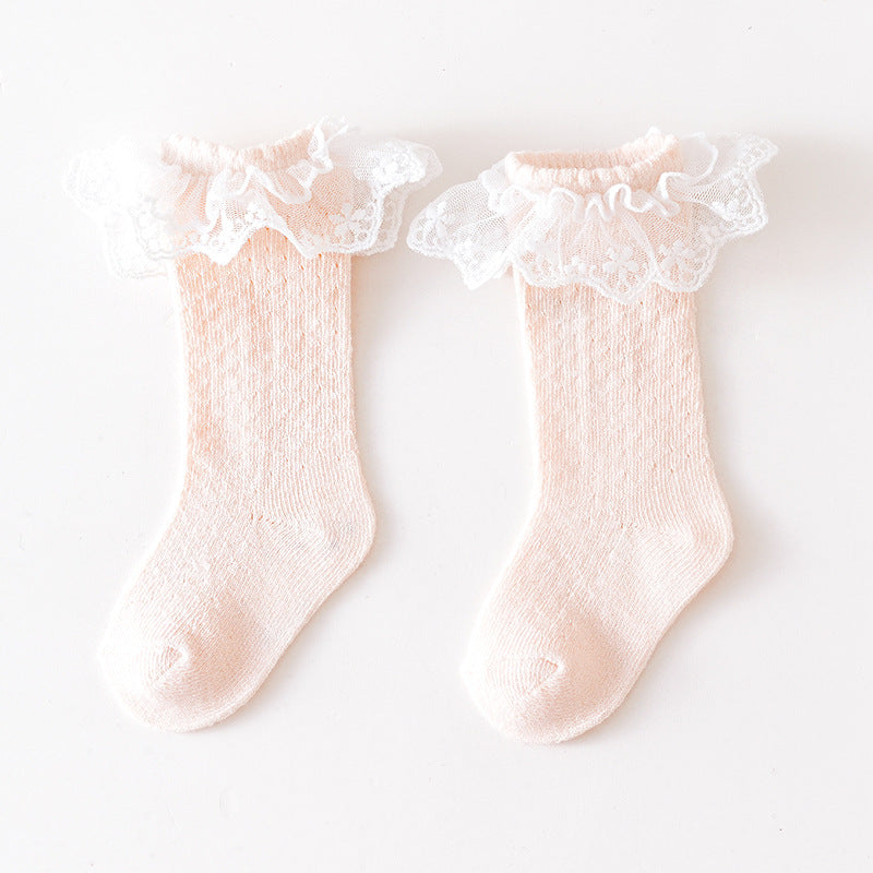 Baby girl solid color lace socks with mesh design, perfect for special occasions and everyday wear.