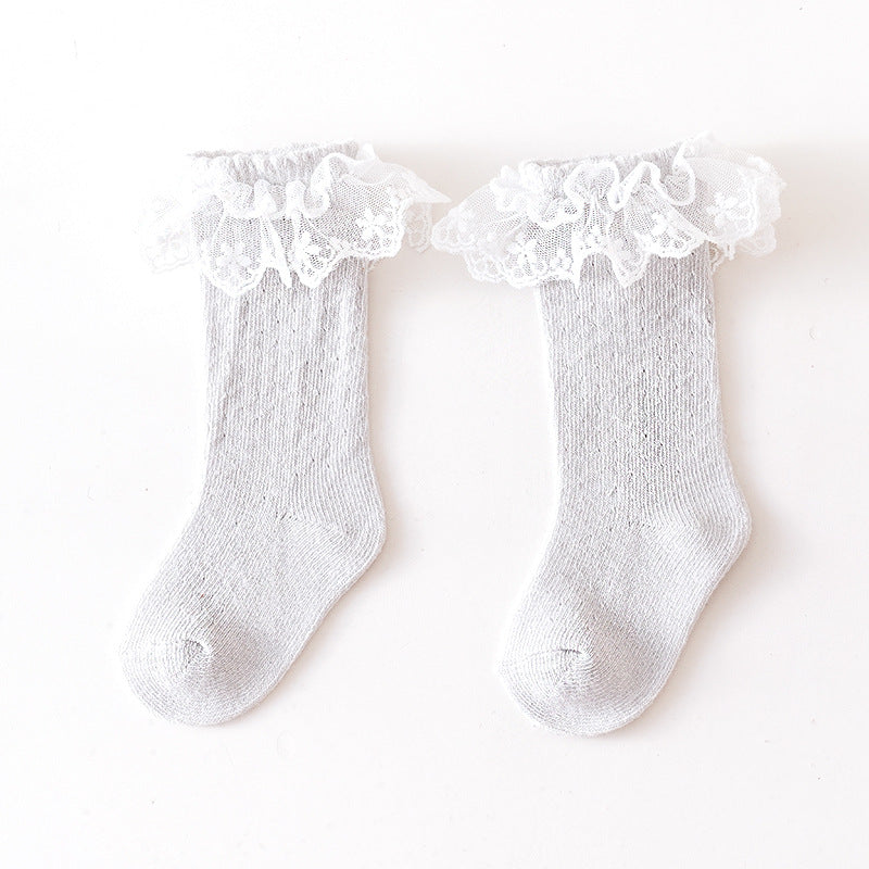 Baby girl solid color lace socks with mesh design, perfect for special occasions and everyday wear.