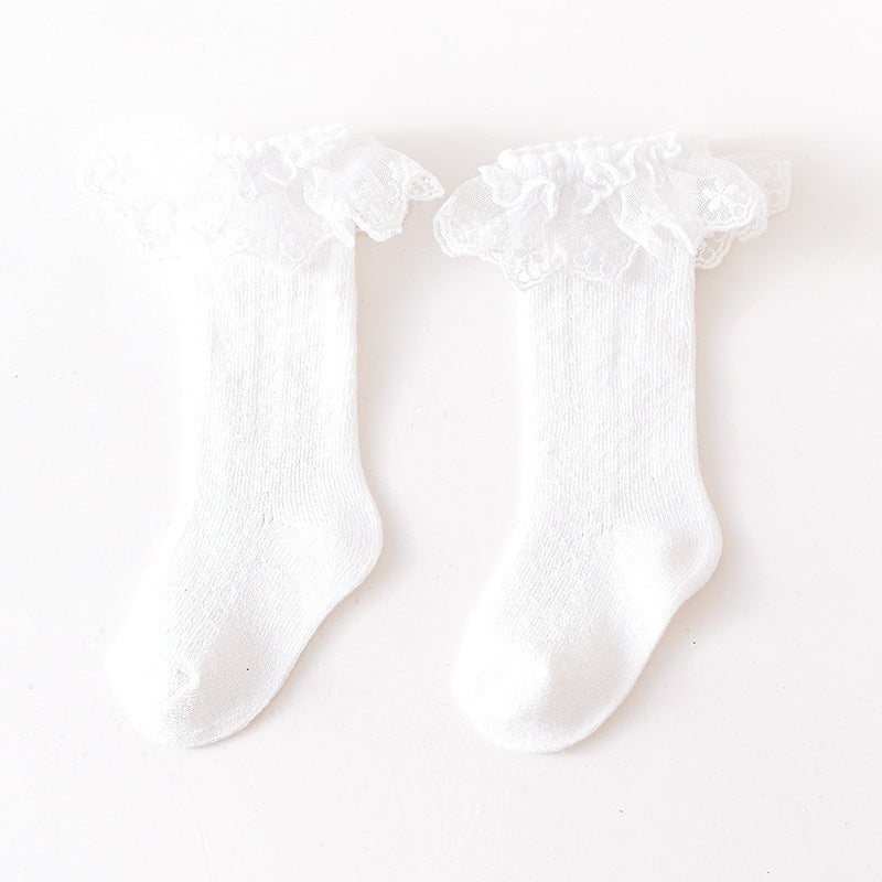 Baby girl solid color lace socks with mesh design, perfect for special occasions and everyday wear.