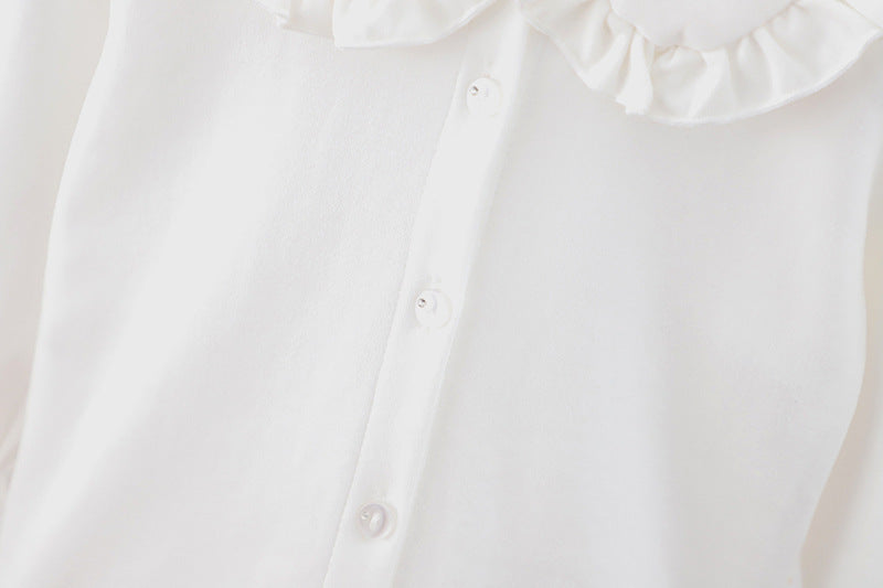 Baby girl solid color shirt with rabbit print and doll-neck collar, perfect for summer wear.