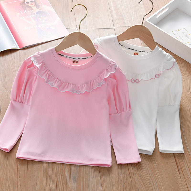 Baby Girl Solid Color Ruffle Design Shirt in white and pink, showcasing ruffle details and soft cotton fabric.