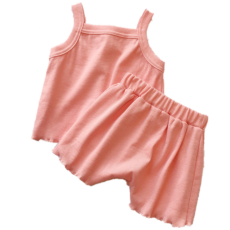 Baby girl solid color sleeveless vest with matching shorts set in various colors, made from soft cotton fabric.