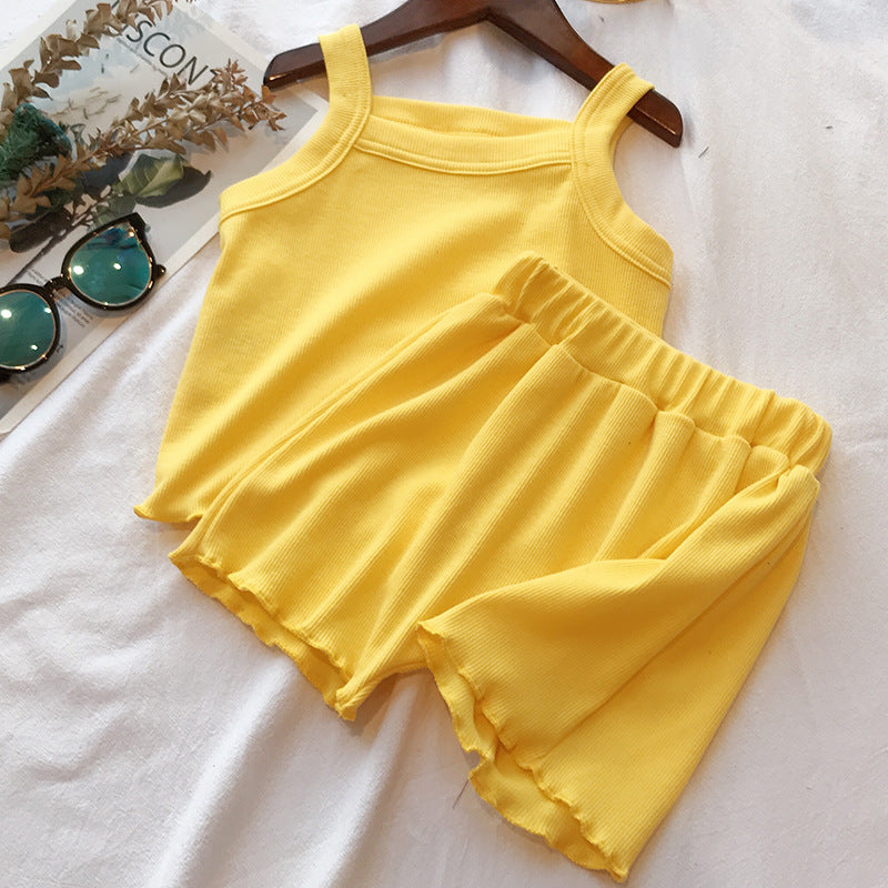 Baby girl solid color sleeveless vest with matching shorts set in various colors, made from soft cotton fabric.