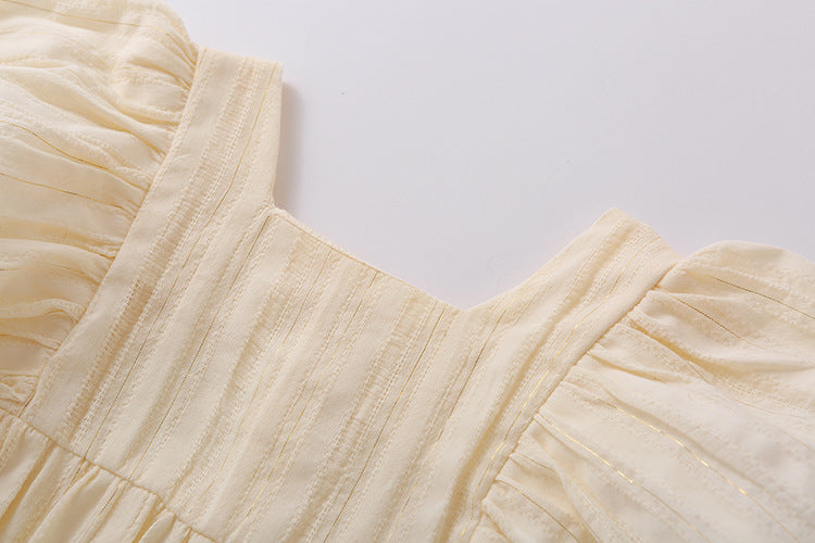 Baby girl solid color short-sleeved onesie with square collar and matching headband in pink, yellow, and beige options.