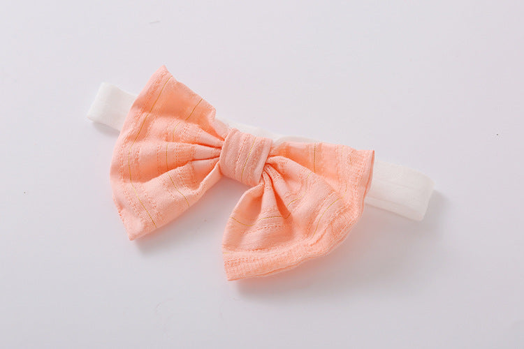 Baby girl solid color short-sleeved onesie with square collar and matching headband in pink, yellow, and beige options.