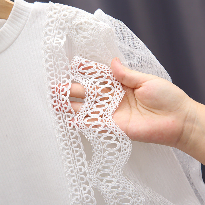 Baby Girl Solid Color Sweat Style Blouser with Mesh Doll Neck and Puff Sleeves in pink, showcasing its elegant design and soft material.