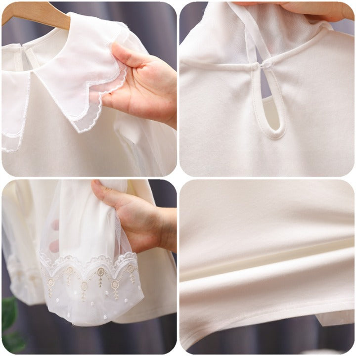 Baby Girl Solid Color Sweat Style Blouser with Mesh Doll Neck and Puff Sleeves in pink, showcasing its elegant design and soft material.