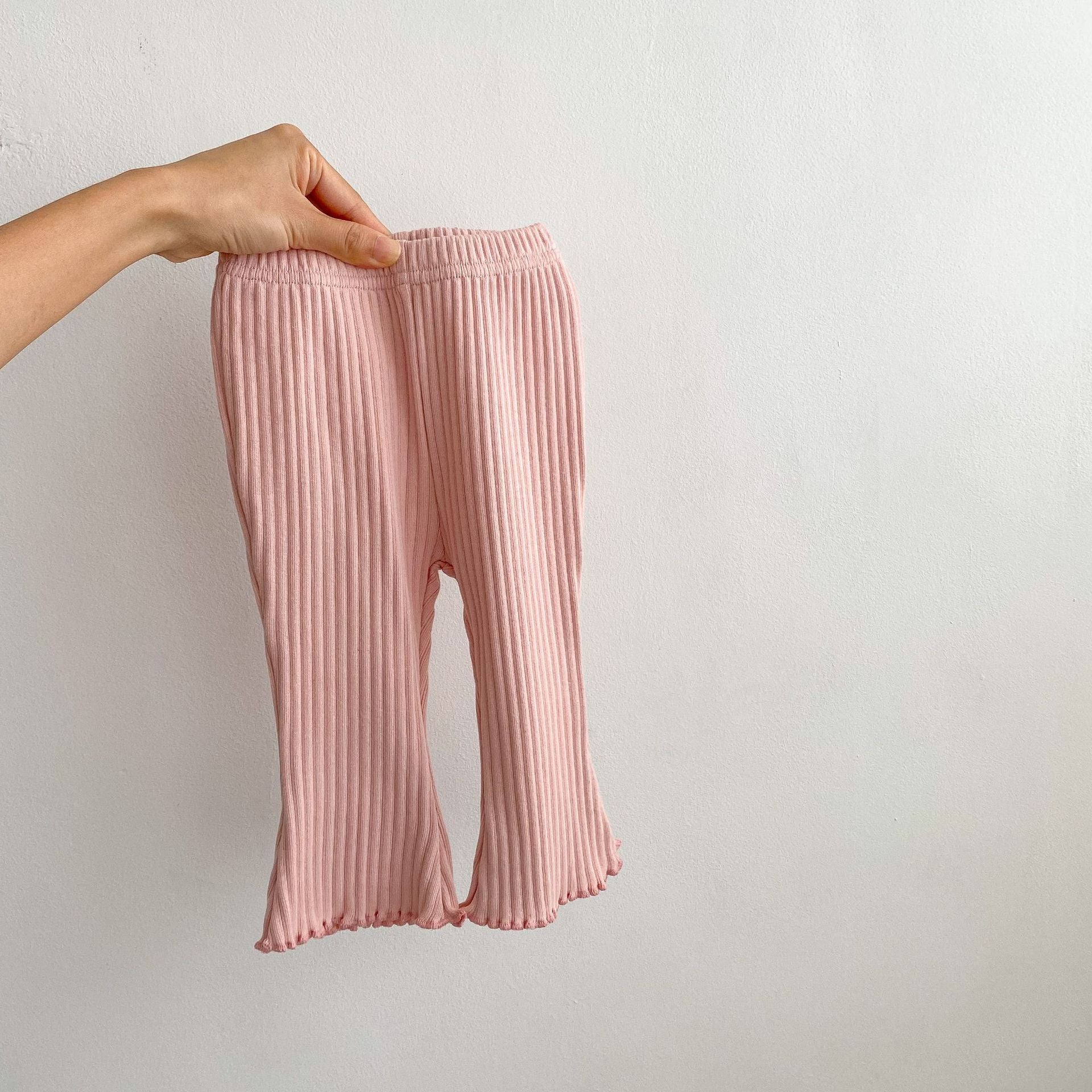 Baby girl soft cotton pants featuring a unique wooden ear design in solid colors.