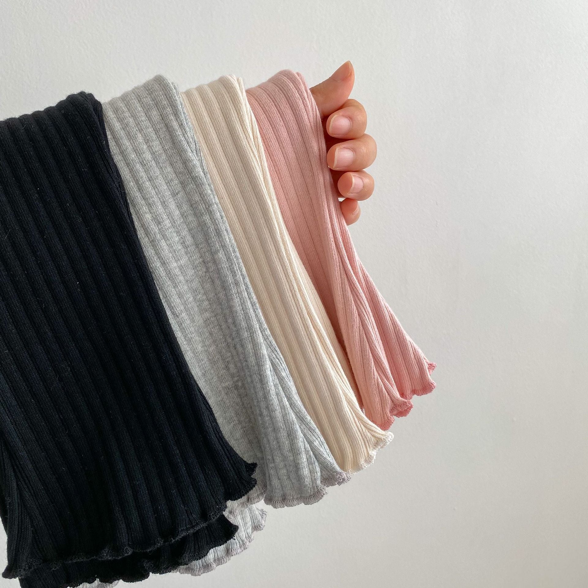 Baby girl soft cotton pants featuring a unique wooden ear design in solid colors.