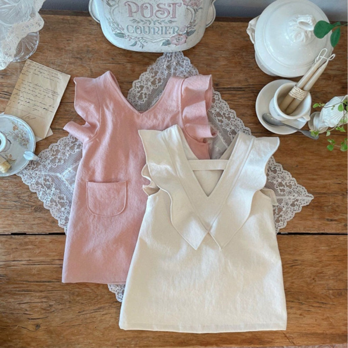 Baby Girl Solid V-Collars Combo Pockets Design Dress in pink and beige, featuring a stylish V-collar and convenient pockets.