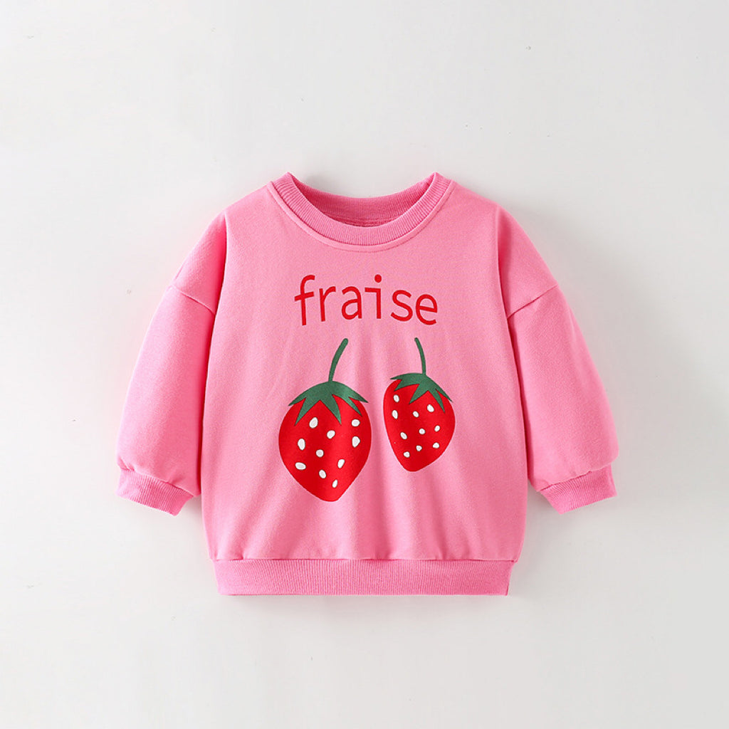Baby girl wearing a strawberry print pattern crewneck terry hoodie in pink, showcasing a vibrant and playful design.