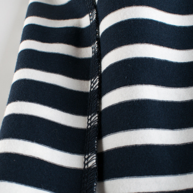 Baby girl sleeveless vest top featuring a striped pattern and embroidered design in black color.