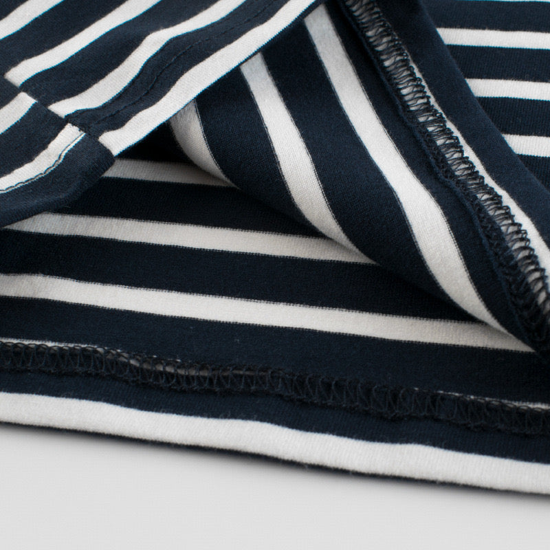 Baby girl sleeveless vest top featuring a striped pattern and embroidered design in black color.