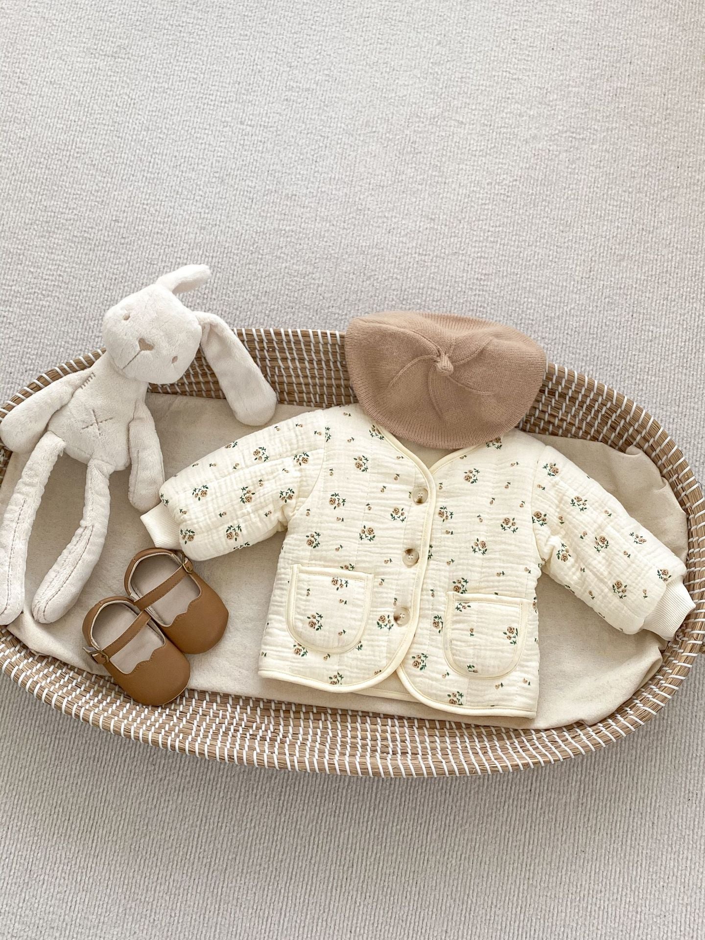 Baby clothes and toy bunny