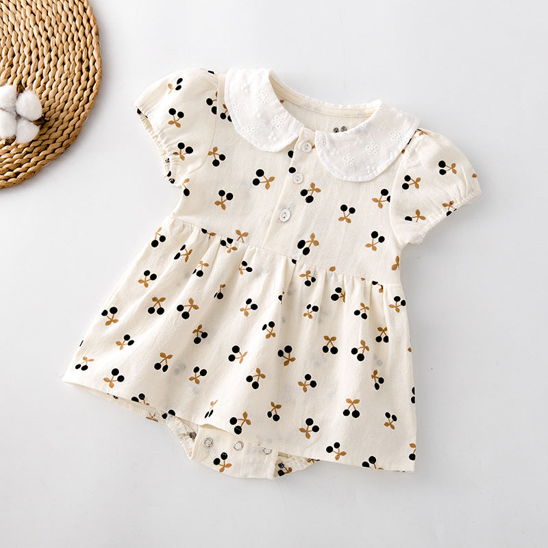 Baby girls cherry print onesie featuring a doll collar and puff sleeves in apricot color.