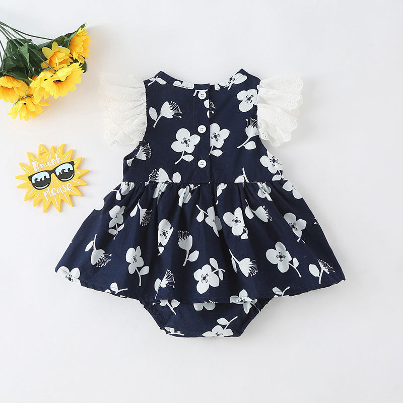 A cute baby girl wearing a floral print sleeveless dress, showcasing a vibrant design with an O-neck and single-breasted style, perfect for summer.