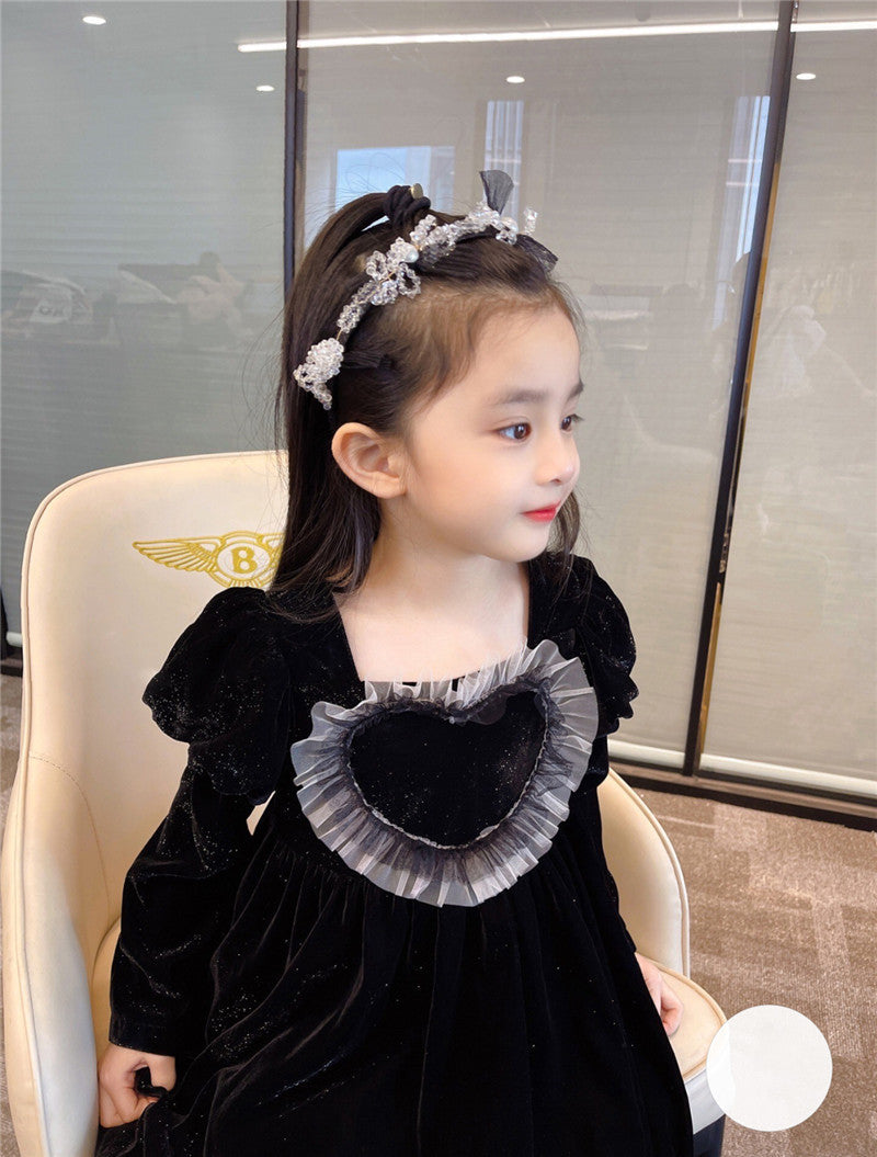 Baby Girls Heart Shape Ruffle Square Neck Long Sleeved Black Princess dress featuring a heart pattern and ruffle details, perfect for young girls.
