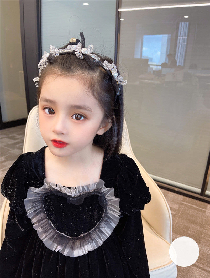 Baby Girls Heart Shape Ruffle Square Neck Long Sleeved Black Princess dress featuring a heart pattern and ruffle details, perfect for young girls.