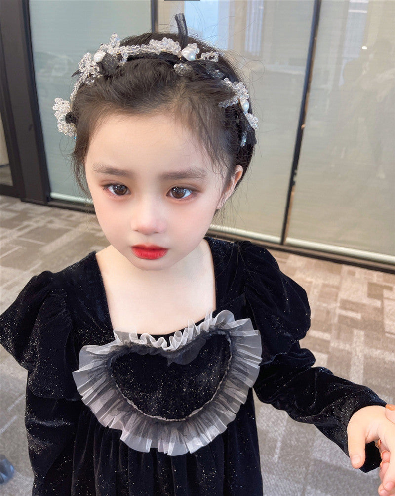 Baby Girls Heart Shape Ruffle Square Neck Long Sleeved Black Princess dress featuring a heart pattern and ruffle details, perfect for young girls.