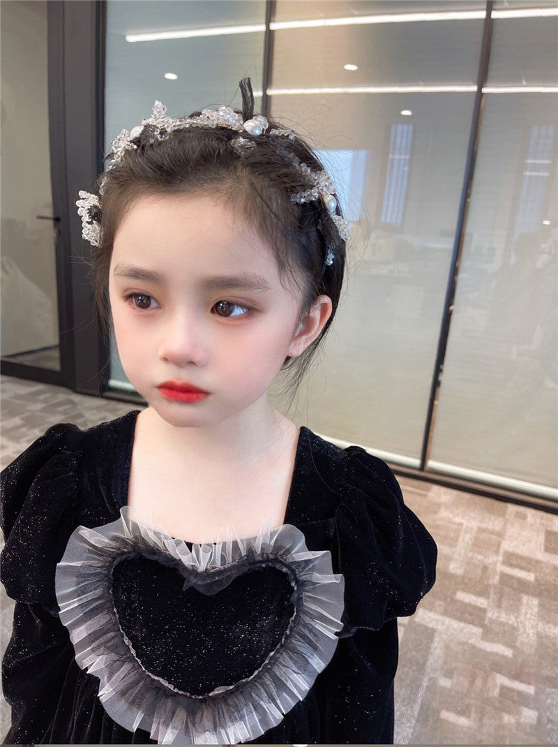 Baby Girls Heart Shape Ruffle Square Neck Long Sleeved Black Princess dress featuring a heart pattern and ruffle details, perfect for young girls.