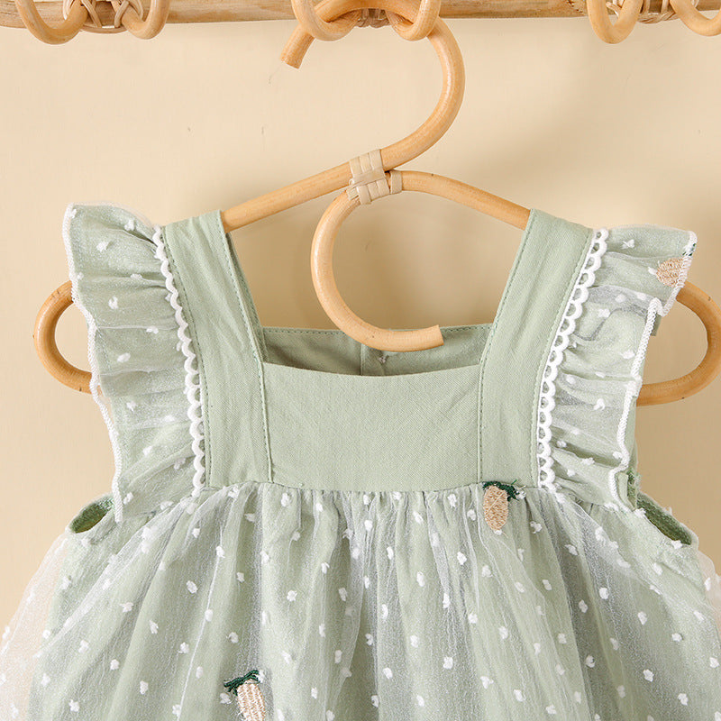 Baby girls dress featuring pineapple embroidery, polka dot lace patchwork, and square collar in vibrant green color.