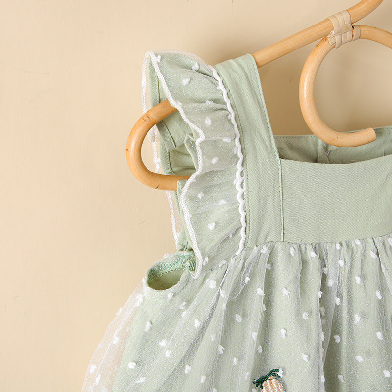 Baby girls dress featuring pineapple embroidery, polka dot lace patchwork, and square collar in vibrant green color.