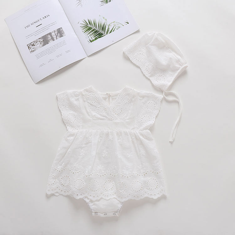 Baby girl wearing a solid color hollow design V collar sleeveless onesies dress in white, perfect for summer outings.