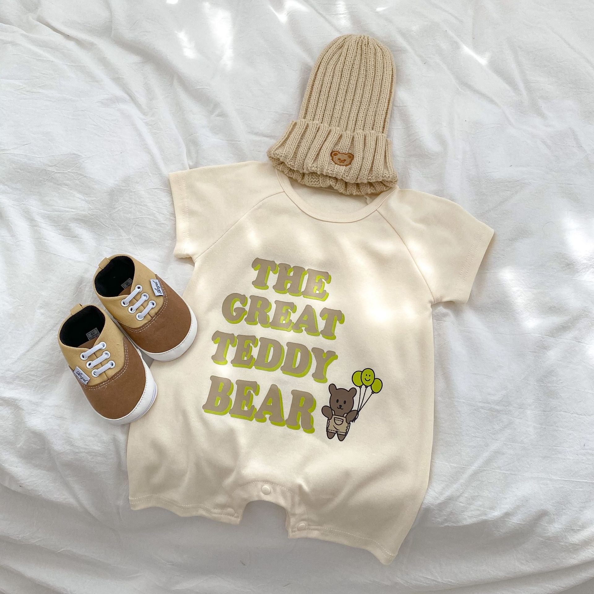 Baby Letter Graphic Crewneck Short Sleeve Casual Romper in apricot color, featuring a playful letter design, perfect for summer wear.