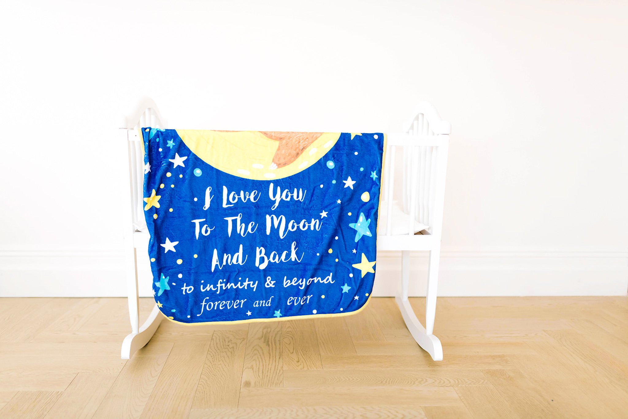 Baby Minky Sloth Blanket featuring sloths, moons, and stars in soft bamboo and minky fabric, perfect for infants and toddlers.