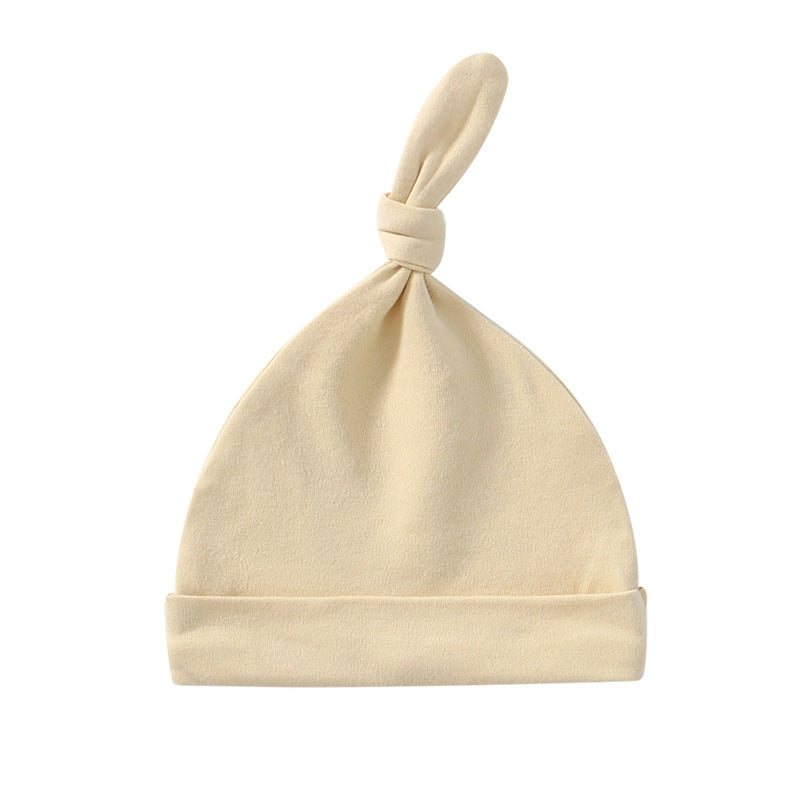 A colorful baby pullover long tail hat made of soft cotton, featuring a vibrant design suitable for both baby boys and girls.