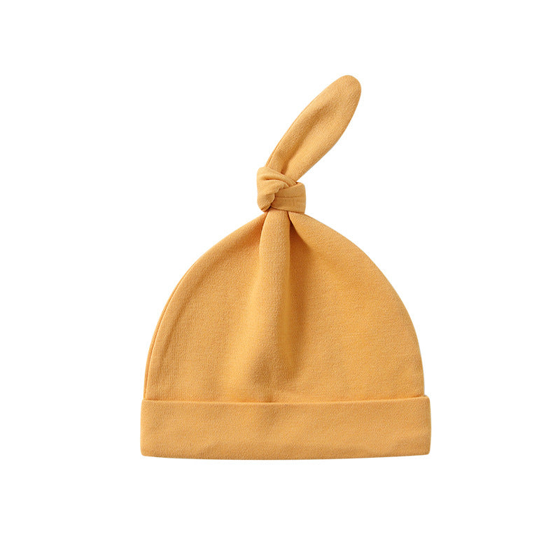 A colorful baby pullover long tail hat made of soft cotton, featuring a vibrant design suitable for both baby boys and girls.