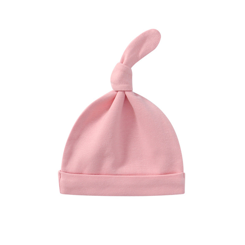 A colorful baby pullover long tail hat made of soft cotton, featuring a vibrant design suitable for both baby boys and girls.