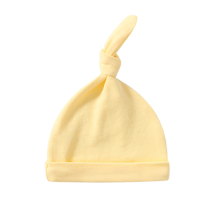 A colorful baby pullover long tail hat made of soft cotton, featuring a vibrant design suitable for both baby boys and girls.