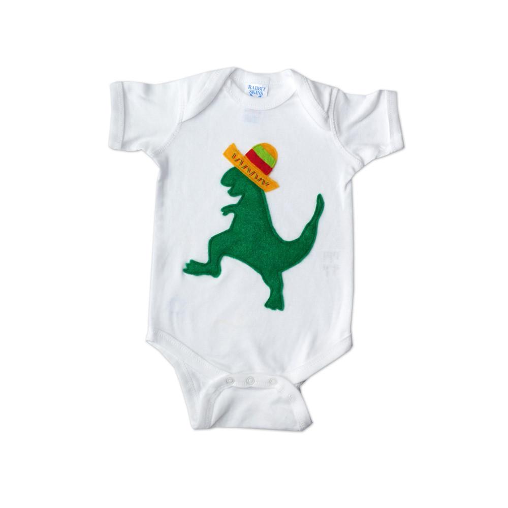 A colorful baby onesie featuring a cheerful Mexican dinosaur wearing a sombrero, handmade with love and care.