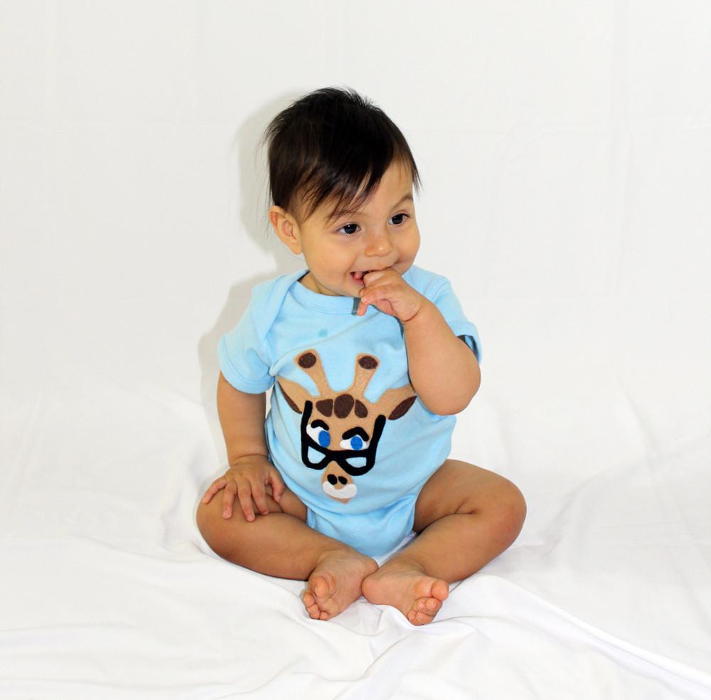 A beautifully designed Baby Onesie - Mitford featuring unique felt appliqué by mi cielo and Donald Robertson, showcasing vibrant colors and artistic flair.