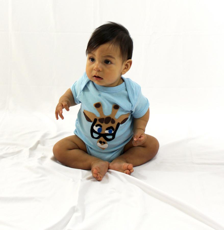 A beautifully designed Baby Onesie - Mitford featuring unique felt appliqué by mi cielo and Donald Robertson, showcasing vibrant colors and artistic flair.