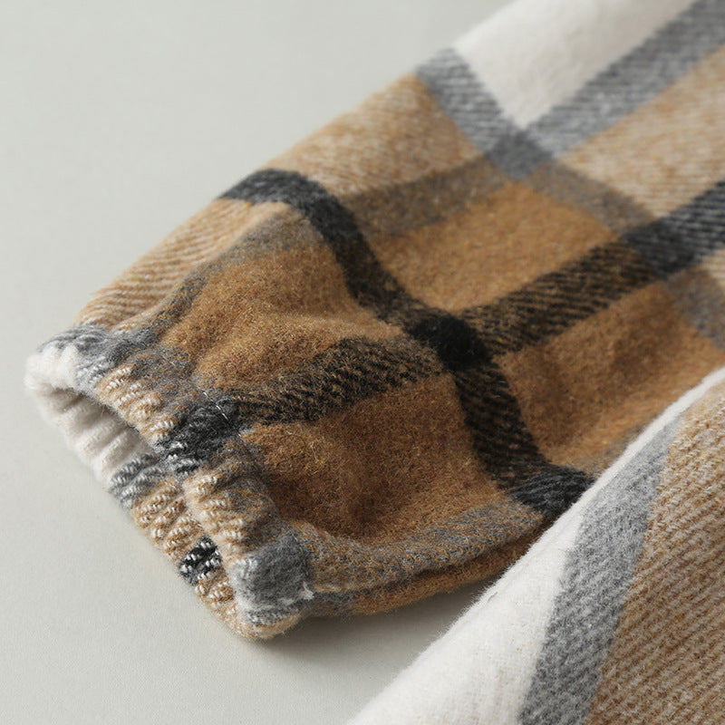 A stylish baby girl dress featuring a plaid pattern, long sleeves, and a matching hat, perfect for autumn wear.