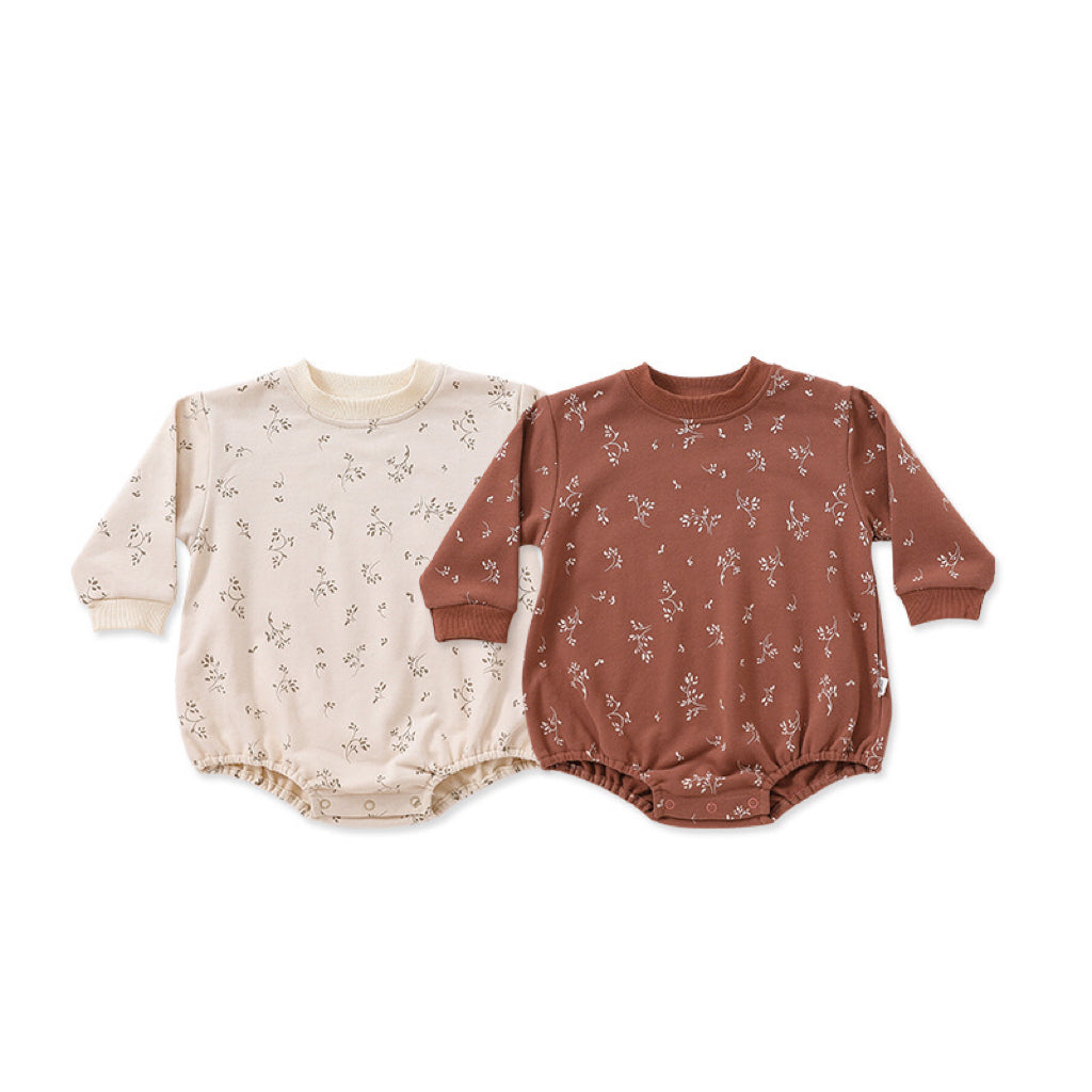 Baby Print Pattern Crewneck Long Sleeve Onesie in beige with triangle detailing, featuring floral and cartoon designs.
