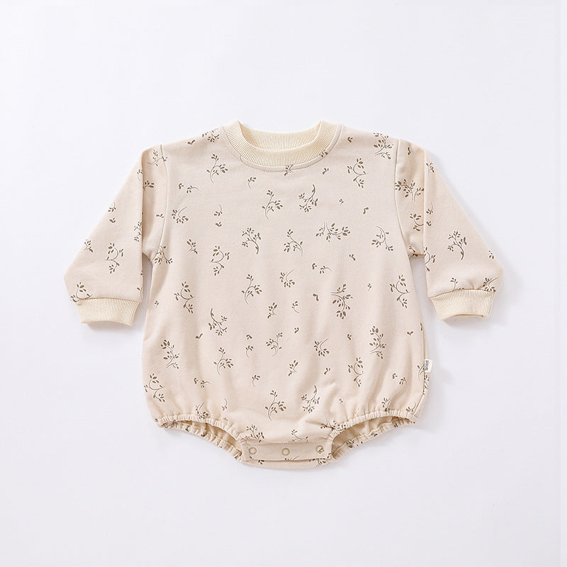 Baby Print Pattern Crewneck Long Sleeve Onesie in beige with triangle detailing, featuring floral and cartoon designs.